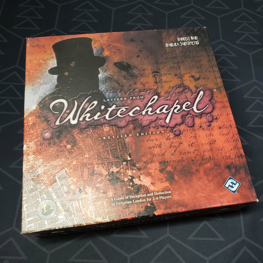 Image shows the front cover of the box of the Letters From Whitechapel board game