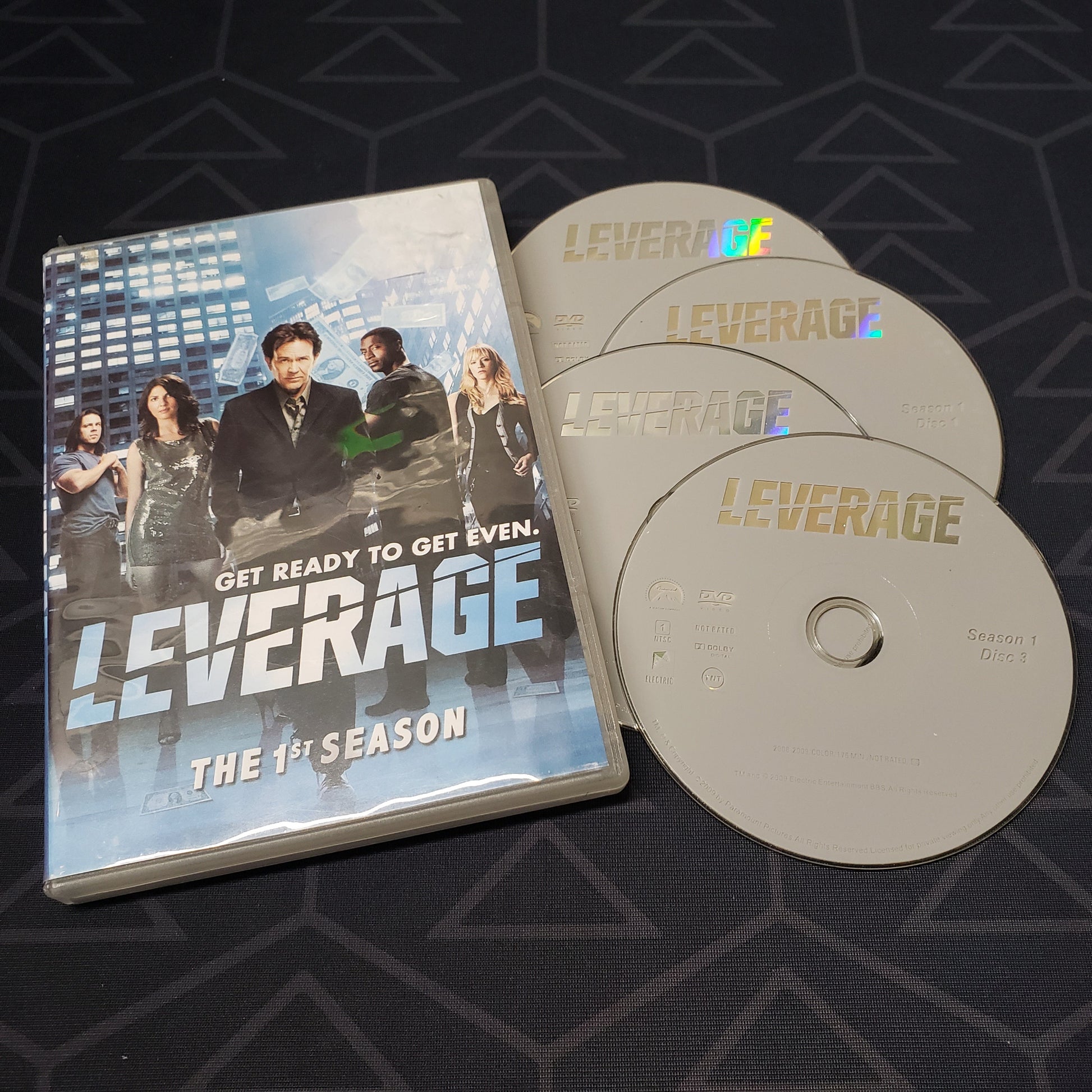 Image shows the case & four discs for Leverage: Season 1 on DVD