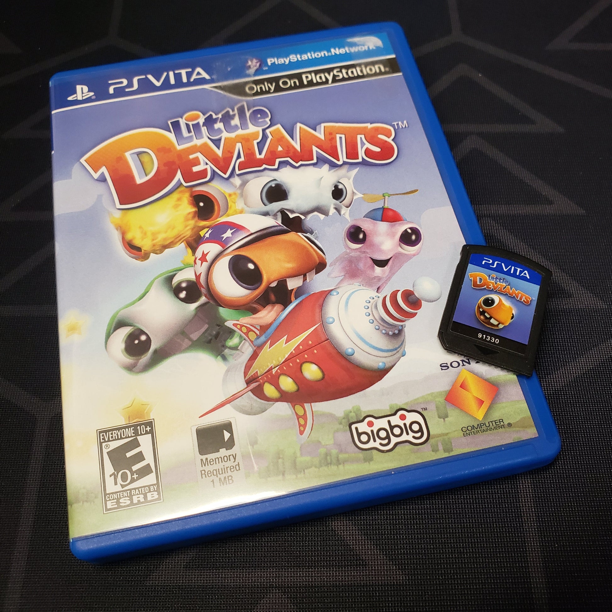 Image shows the case & cartridge for the game Little Deviants for Playstation Vita