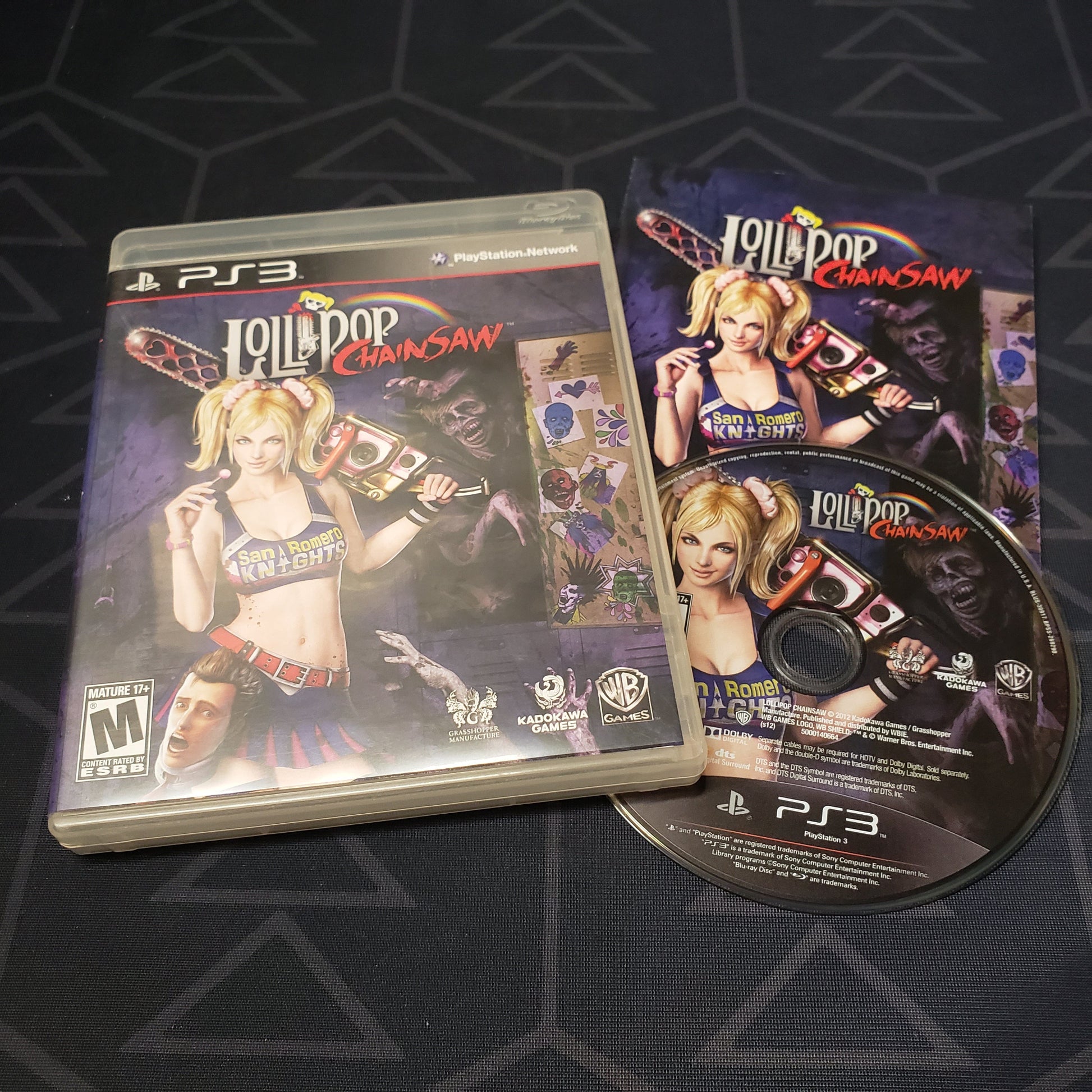 Image shows the case, manual and disc for the video game Lollipop Chainsaw for Playstation 3