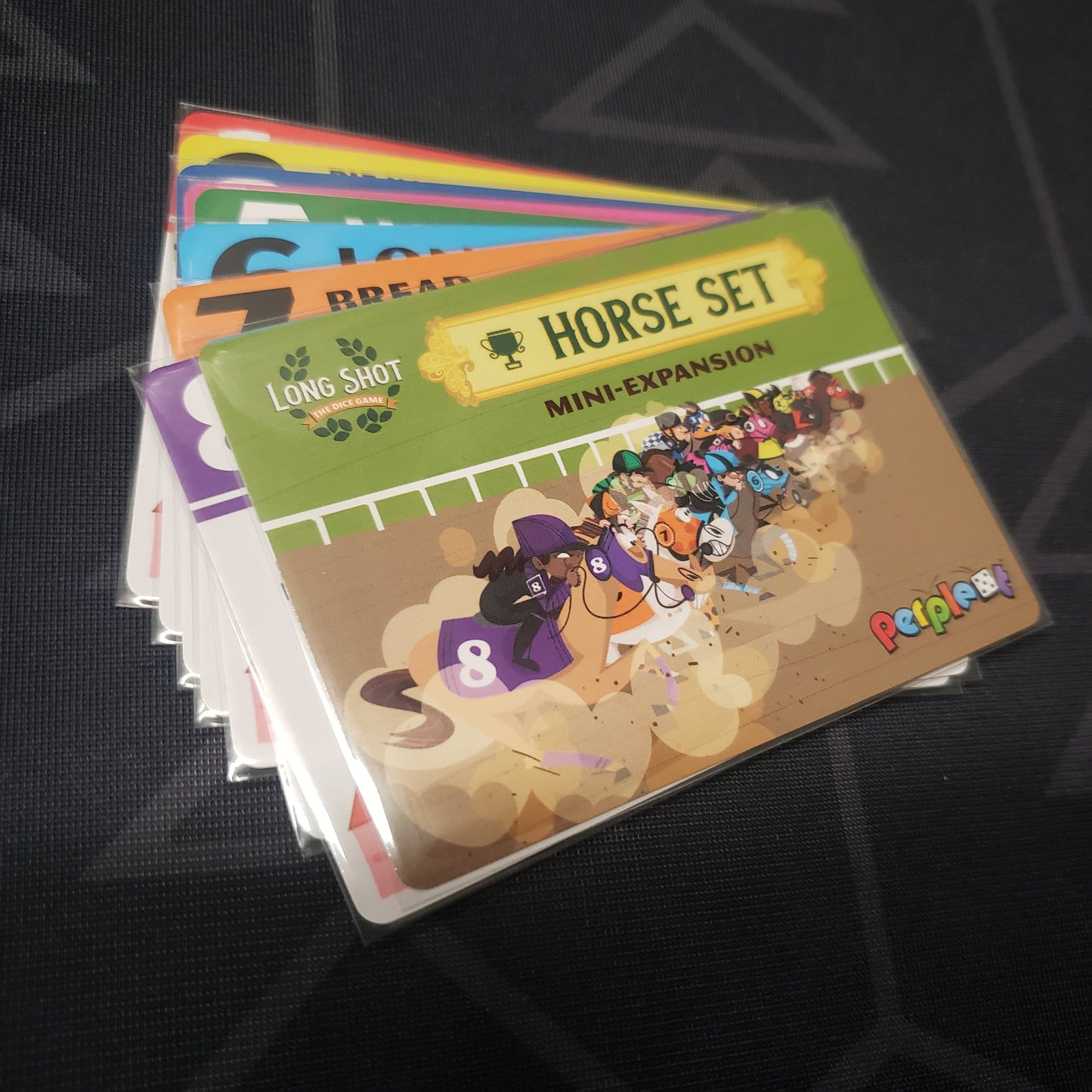 Image shows the fanned-out cards of the Horse Set 7 (Trophy) Mini expansion for the board game Long Shot: The Dice Game