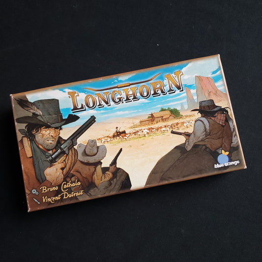 Image shows the front cover of the box of the Longhorn board game