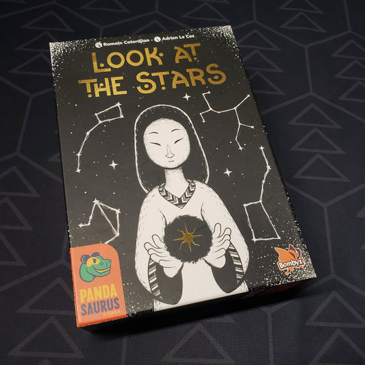 Image shows the front cover of the box for the Look at the Stars board game