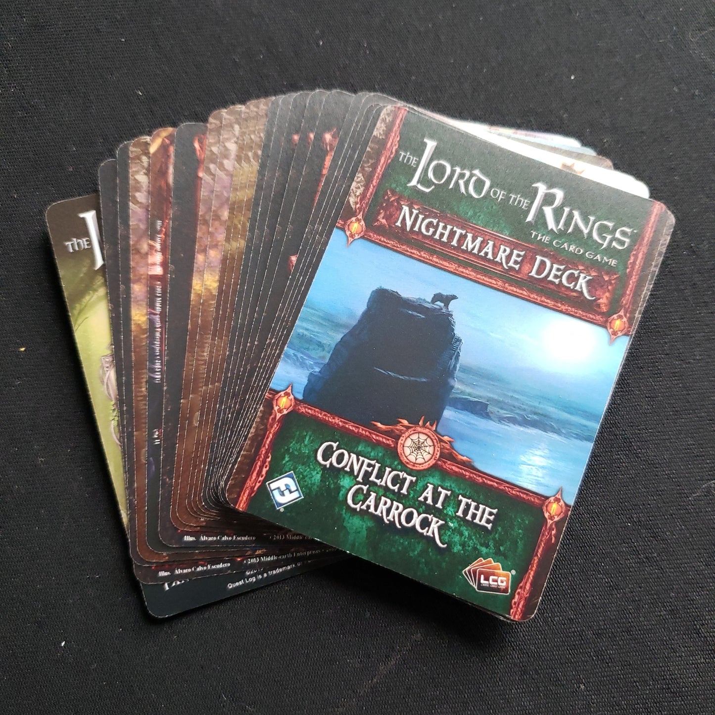 Image shows the cards fanned out for the Conflict At The Carrock nightmare deck for the Lord of the Rings card game