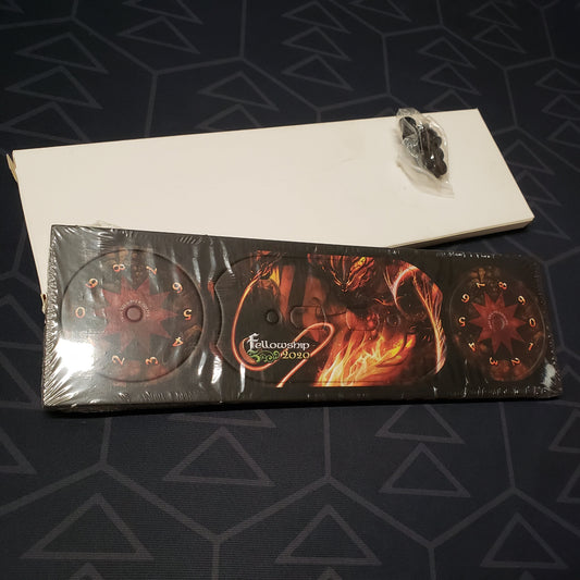 Image shows sealed pack of four of the Fellowship 2020 Promo Threat Tracker for the card game Lord of the Rings sitting on top of the white packing box