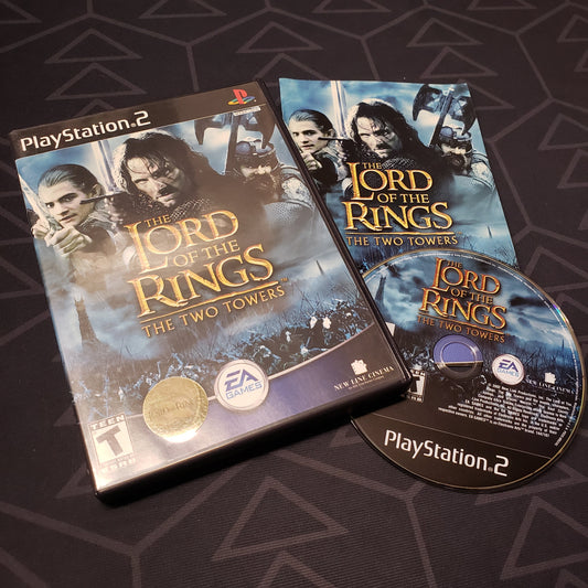 Image shows the case, manual and disc for the video game Lord of the Rings: The Two Towers for Playstation 2