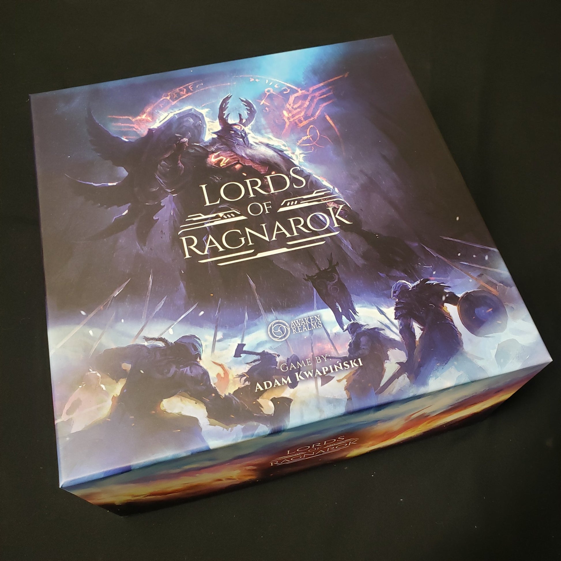 Image shows the front cover of the box of the Lords of Ragnarok board game