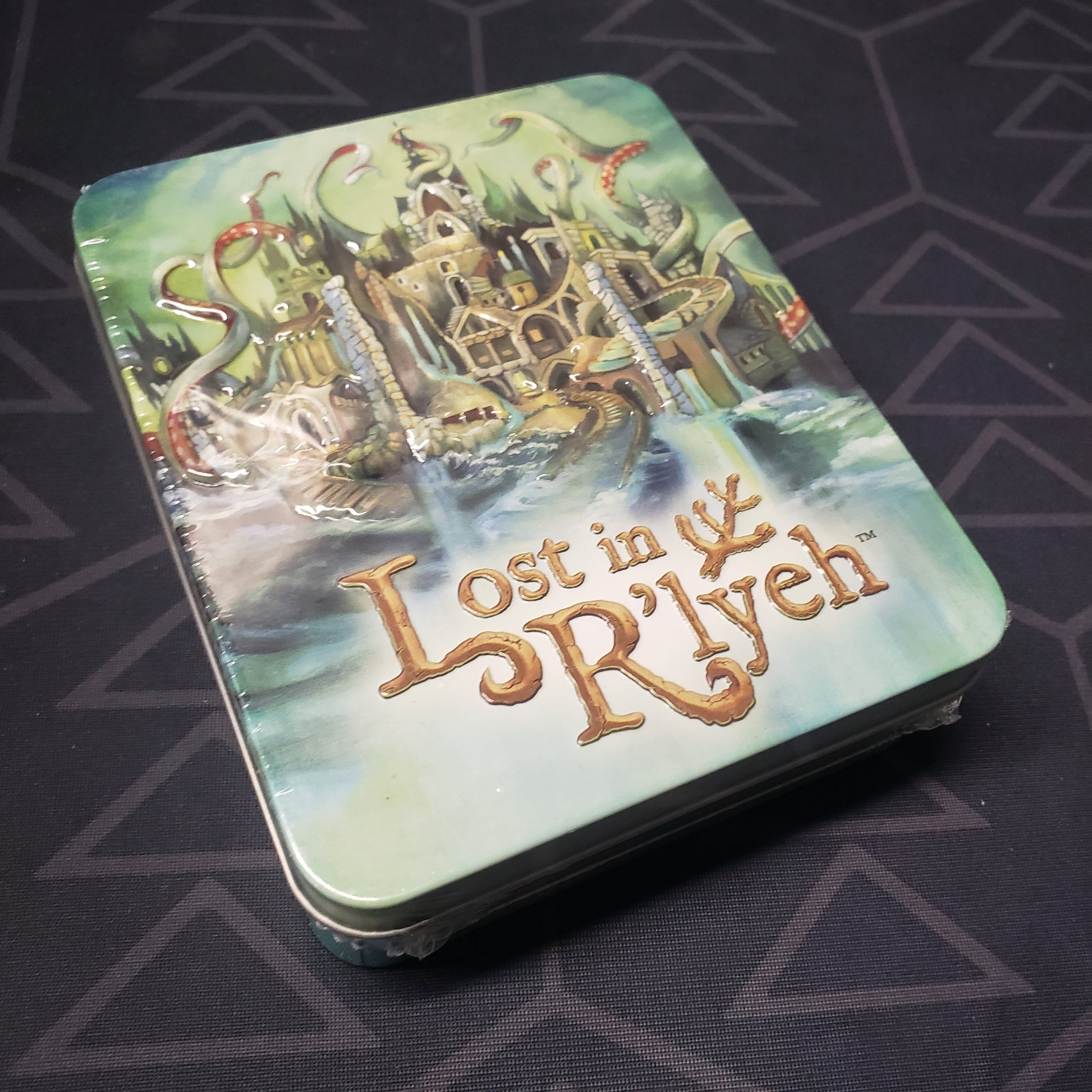 Image shows the front cover of the box for the Lost in R'lyeh card game