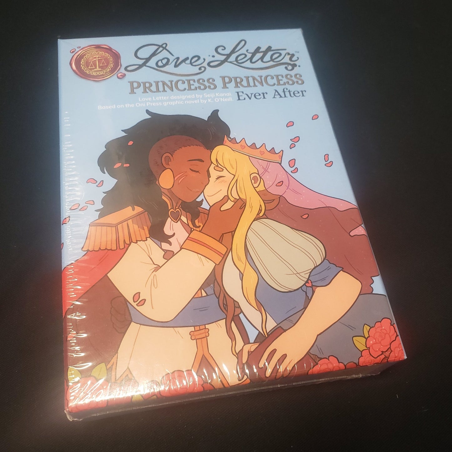 Image shows the front cover of the box of the Love Letter: Princess Princess Ever After card game