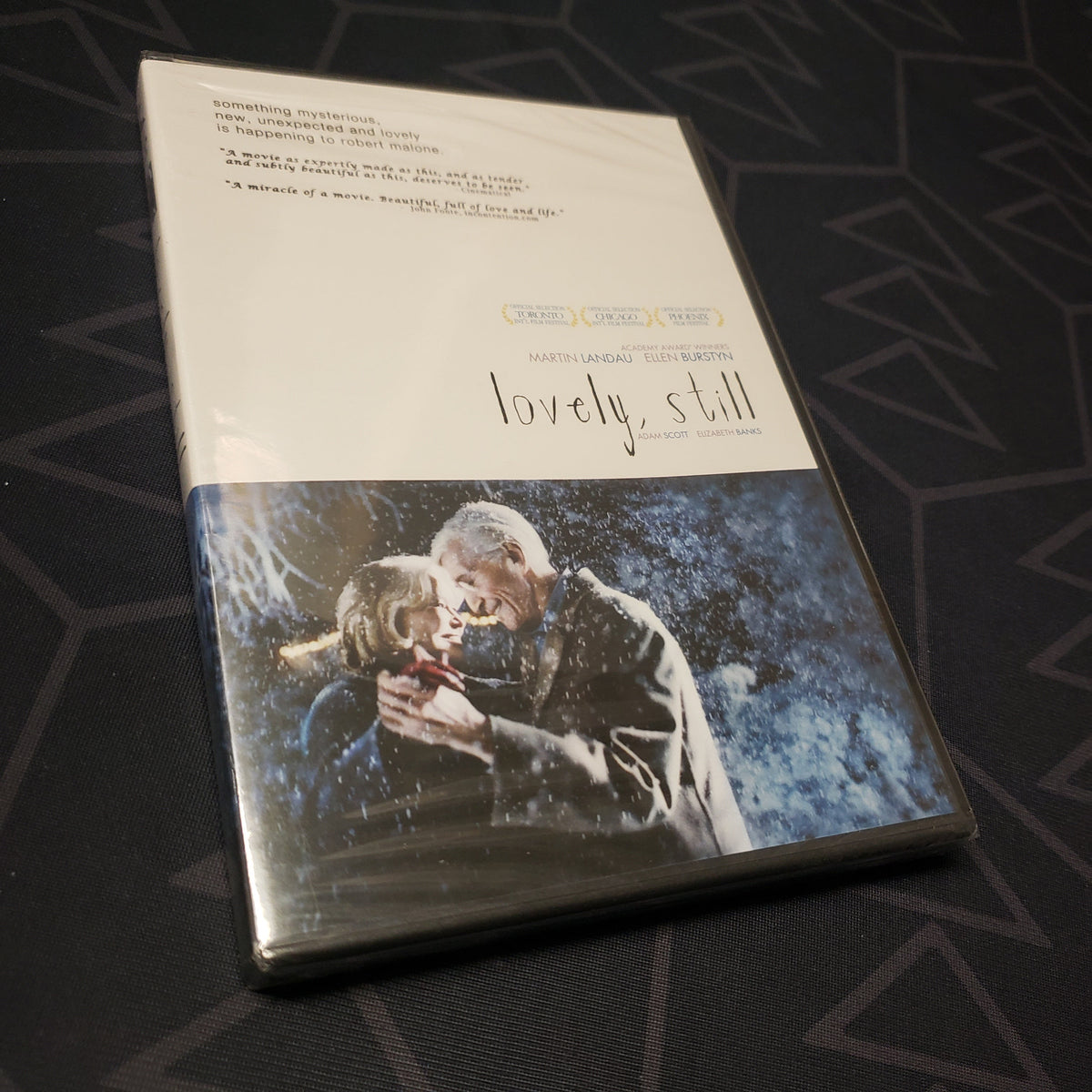 Image shows the front of the case for the movie Lovely, Still on DVD