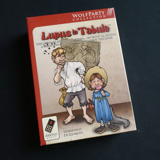 Image shows the front cover of the box of the Lupus In Tabula party game