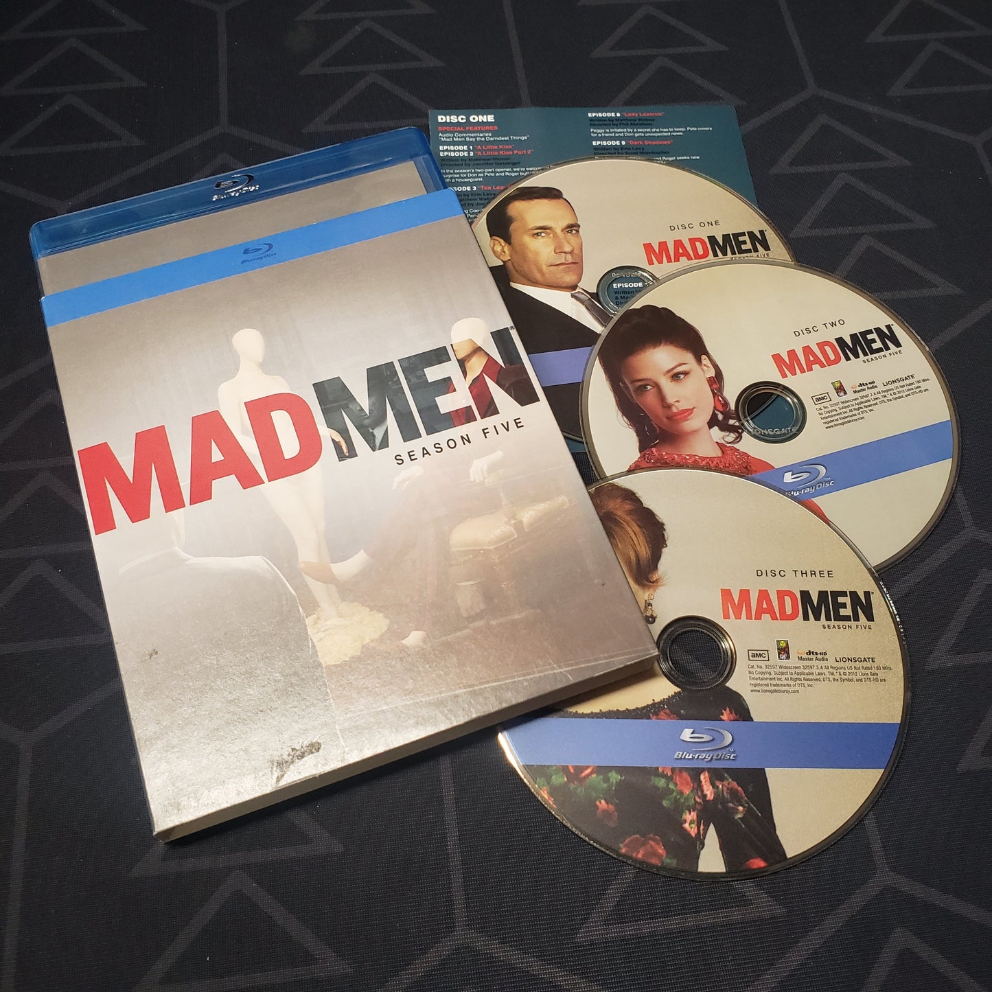 Image shows the case, sleeve, insert & three discs for the fifth season of Mad Men on Blu-Ray