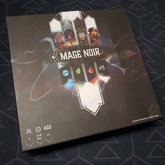 Image shows the front cover of the box for the Mage Noir card game