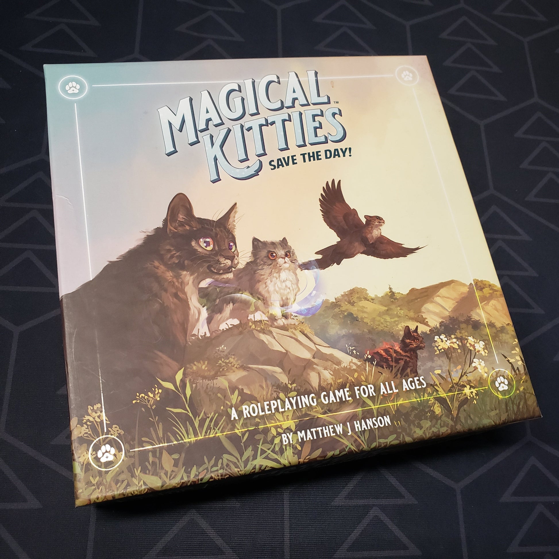 Image shows the front cover of the Deluxe core rules Boxed Set box for the roleplaying game Magical Kitties Save the Day!