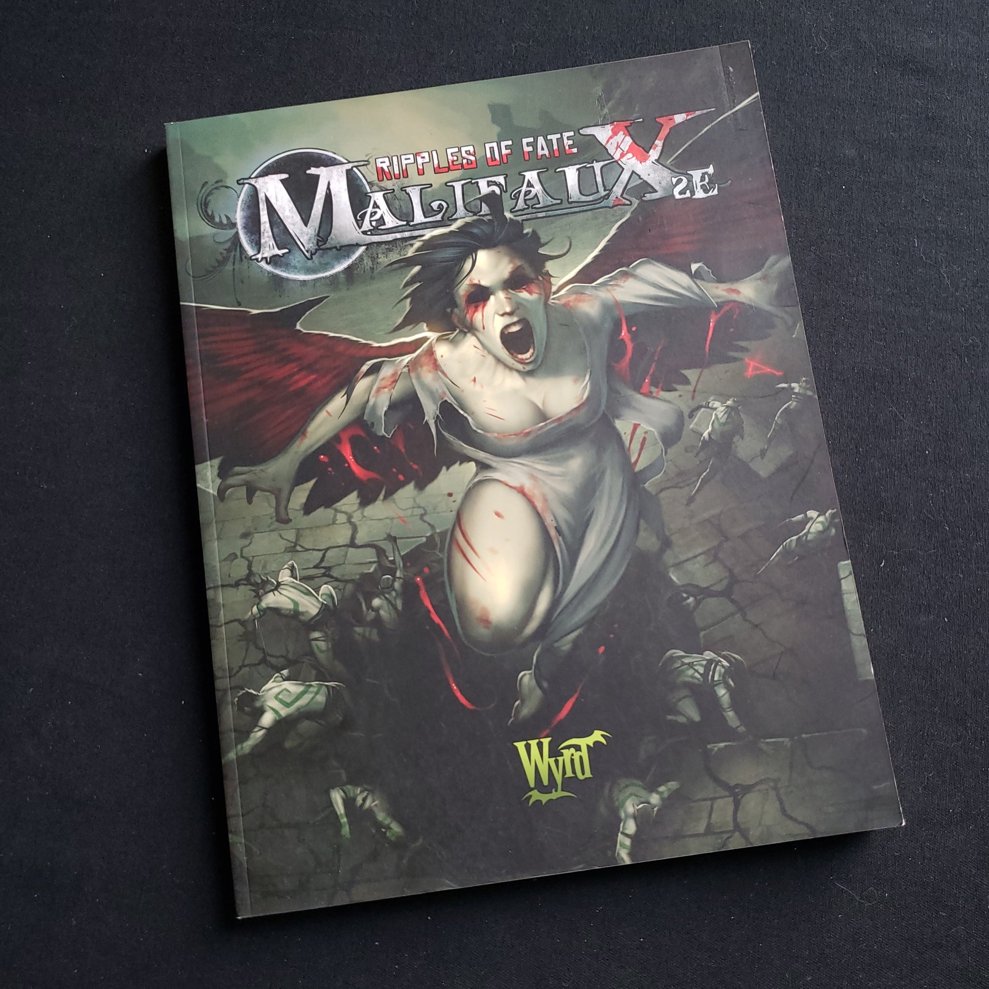 Image shows the front cover of the Ripples of Fate book for the Malifaux Second Edition miniatures game