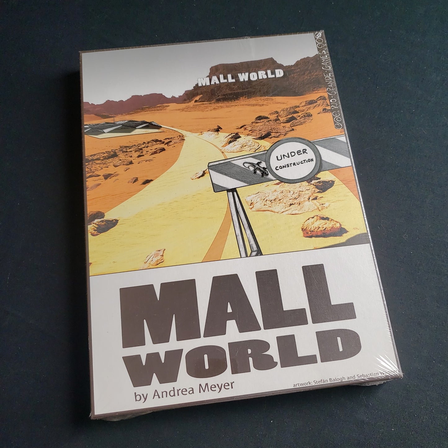 Image shows the front cover of the box of the Mall World board game