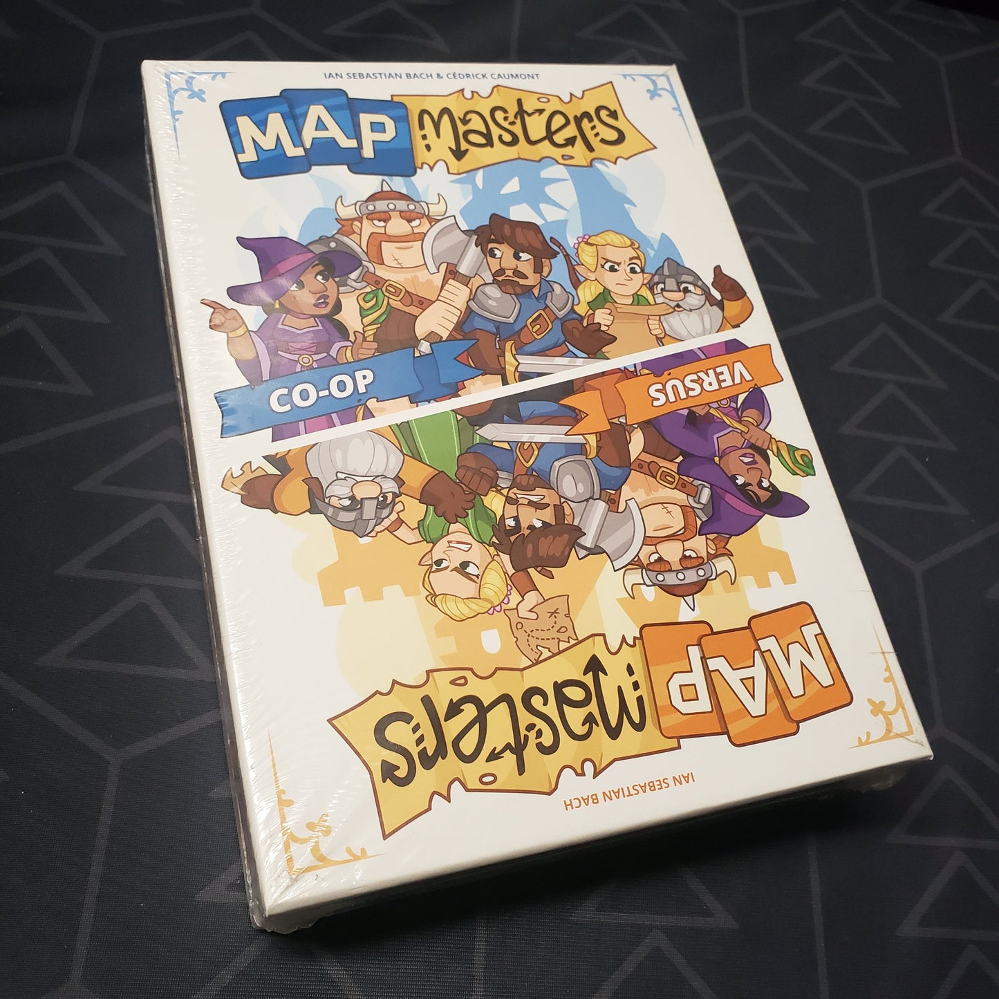 Image shows the front cover of the box for the Map Masters board game