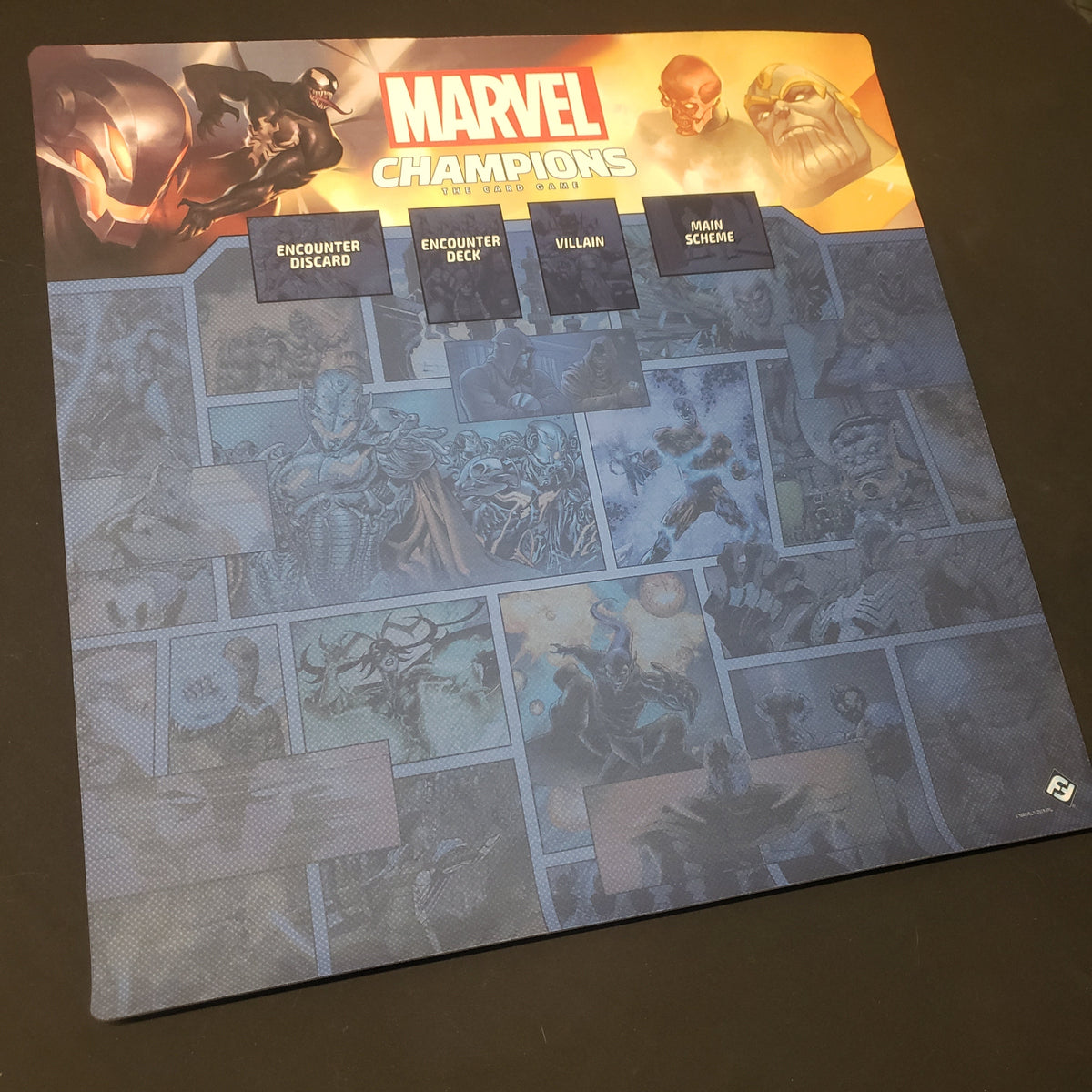 Image shows a multiplayer gaming playmat for the card game Marvel Champions