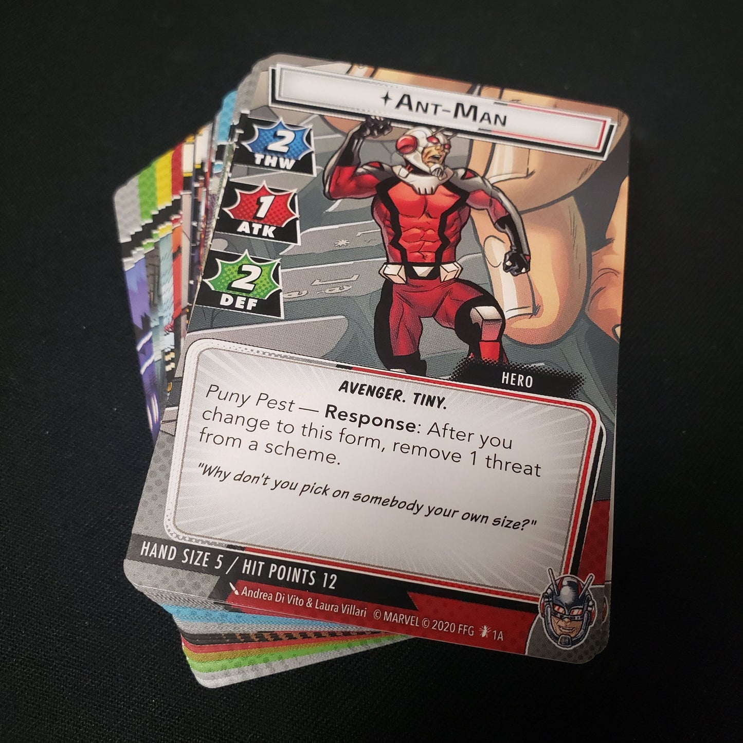 Image shows the cards fanned-out in a stack for the Ant-Man Hero Pack from the Marvel Champions card game