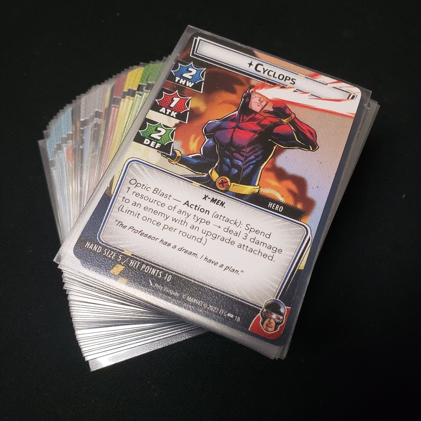 Image shows the cards fanned-out in a stack for the Cyclops Hero Pack from the Marvel Champions card game