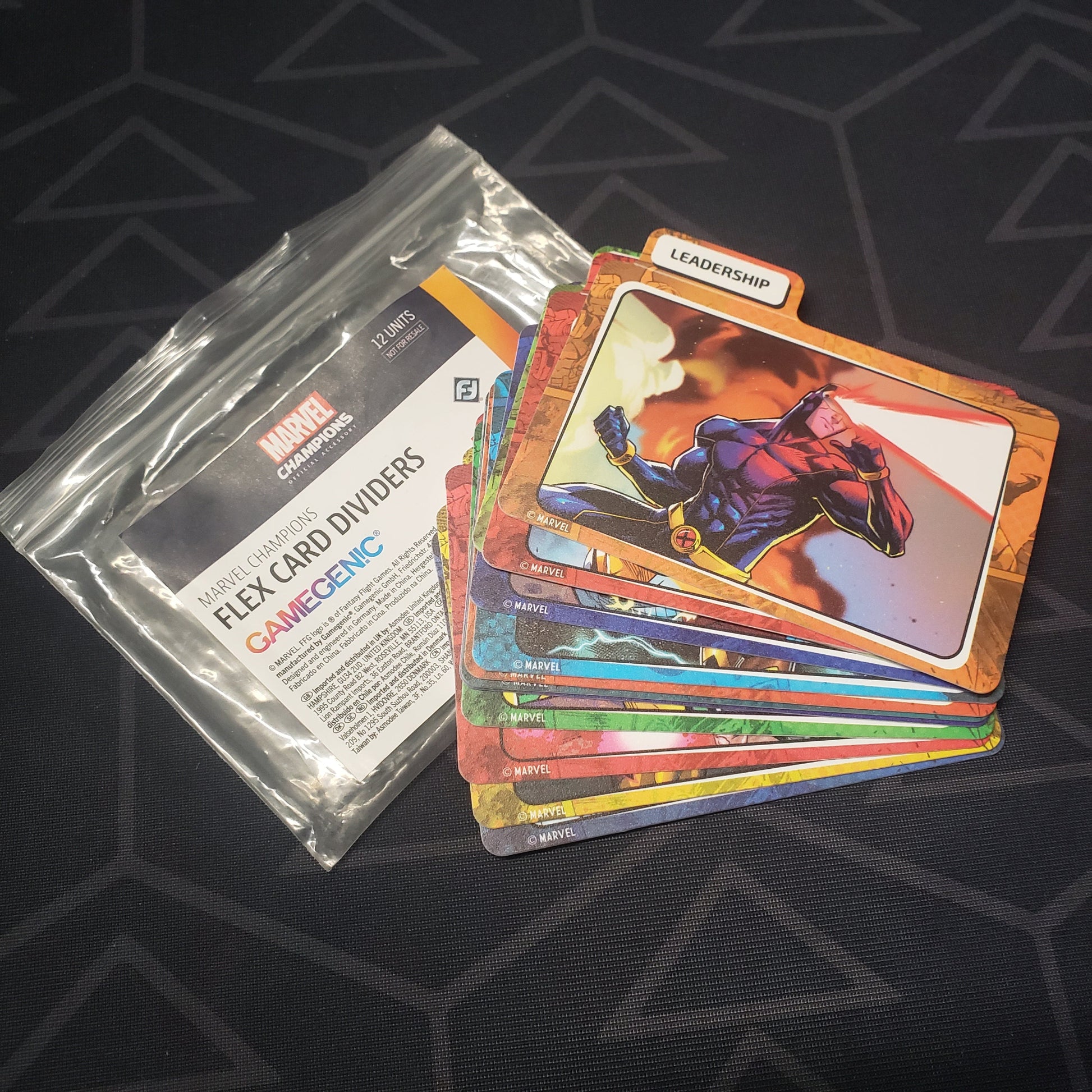 Image shows the front of the and fanned out cards of the Flex Card Dividers pack for the card game Marvel Champions