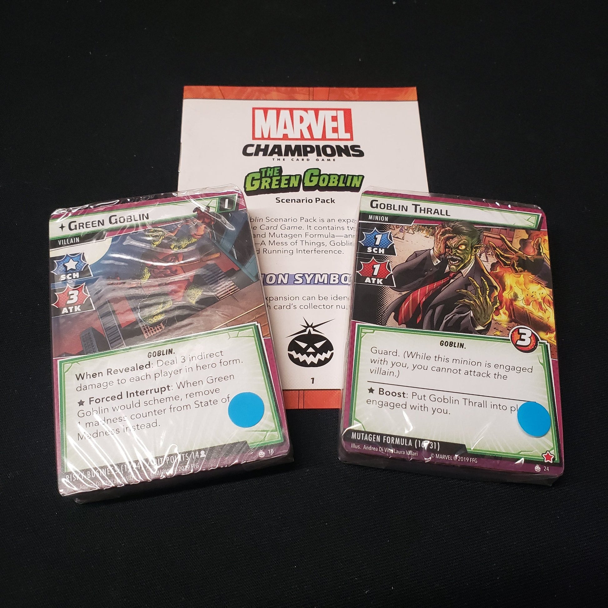 Image shows the cards packs & instructions for the Green Goblin Scenario Pack from the Marvel Champions card game