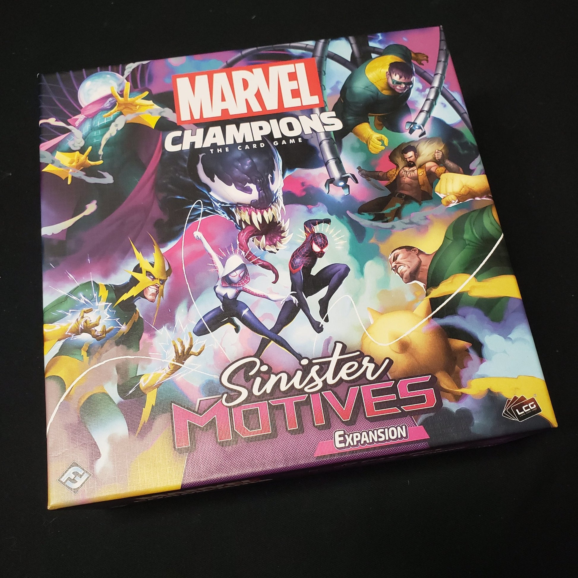 Image shows the front of the box for the Sinister Motives expansion from the Marvel Champions card game