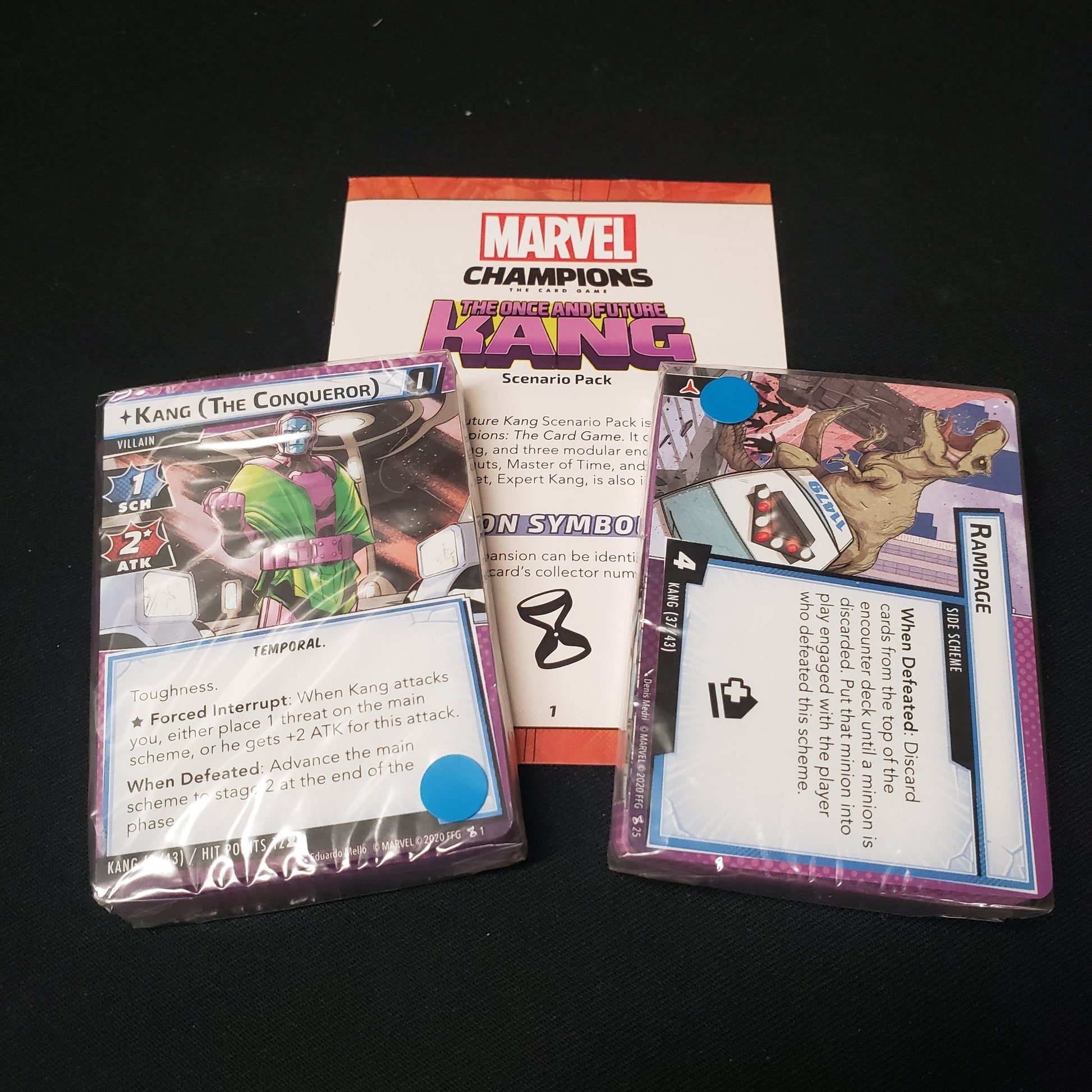 Image shows the cards packs & instructions for the Once & Future Kang Scenario Pack from the Marvel Champions card game