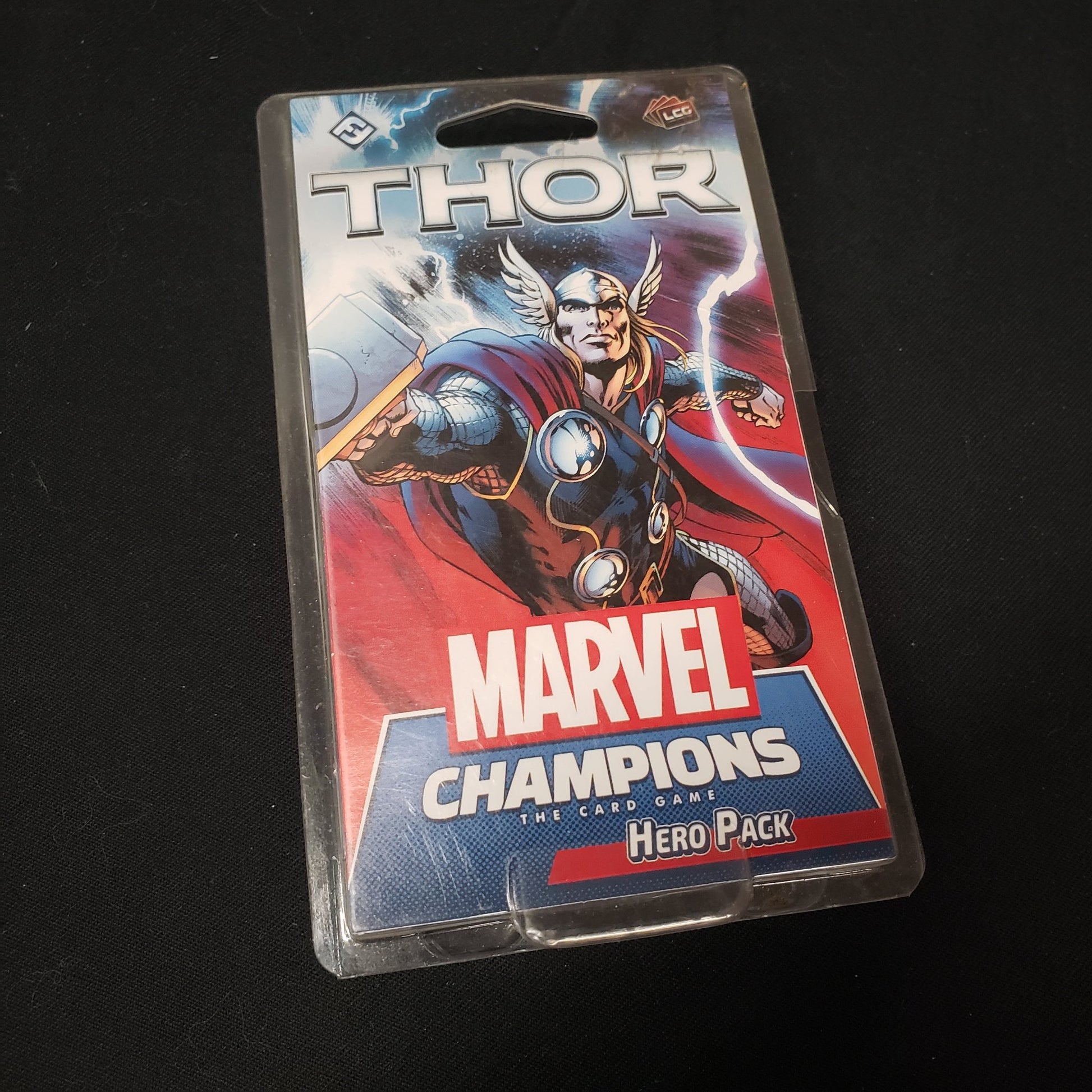 Image shows the front of the package for the Thor Hero Pack from the Marvel Chmpions card game