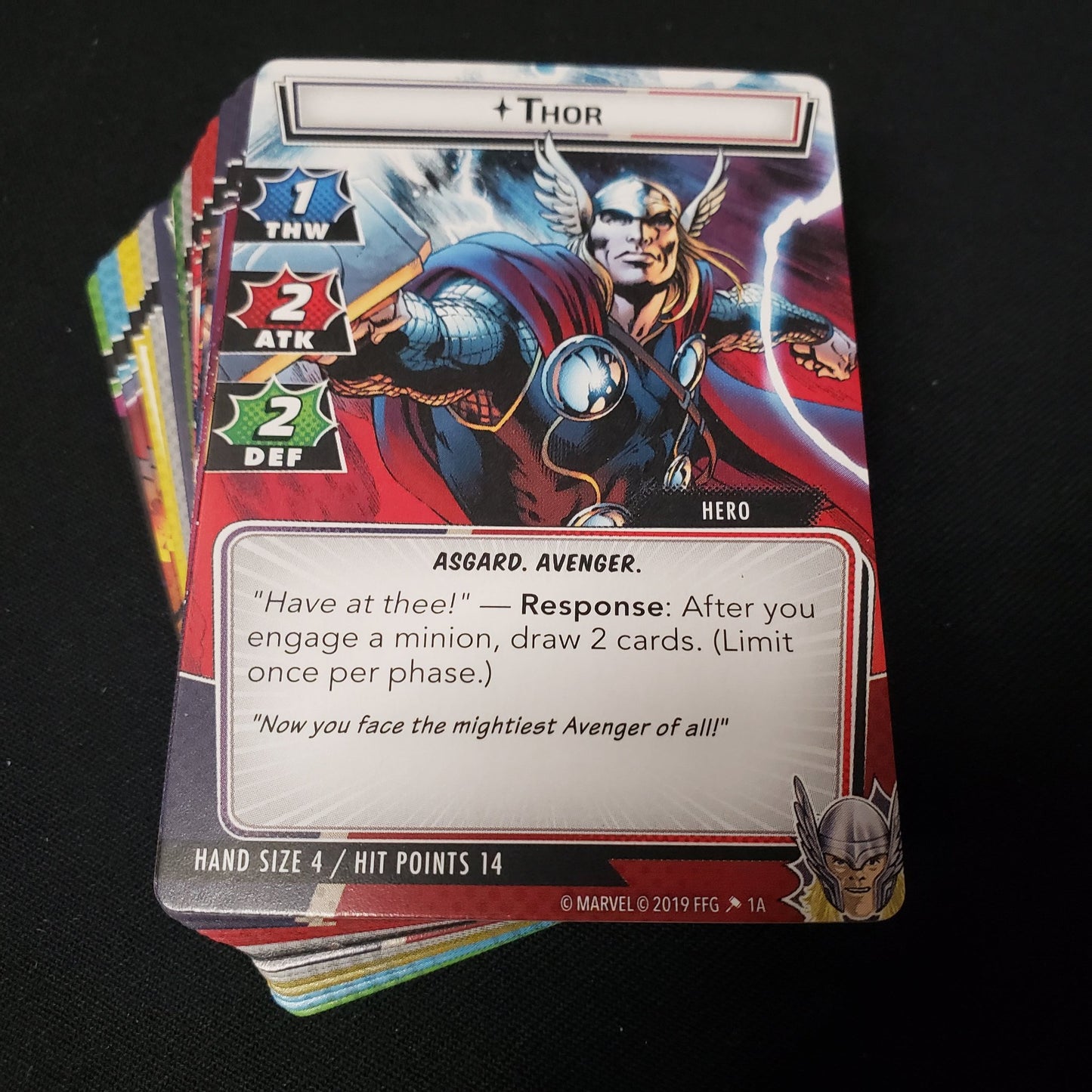 Image shows the cards fanned-out in a stack for the Thor Hero Pack from the Marvel Champions card game