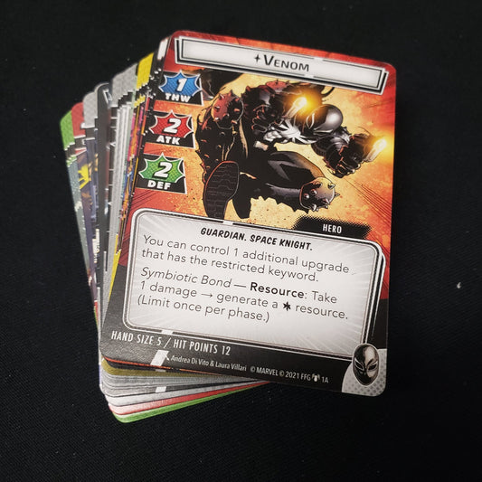 Image shows the cards fanned-out in a stack for the Venom Hero Pack from the Marvel Champions card game