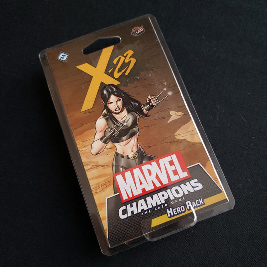 Image shows the front of the package for the X-23 Hero Pack for the Marvel Champions card game