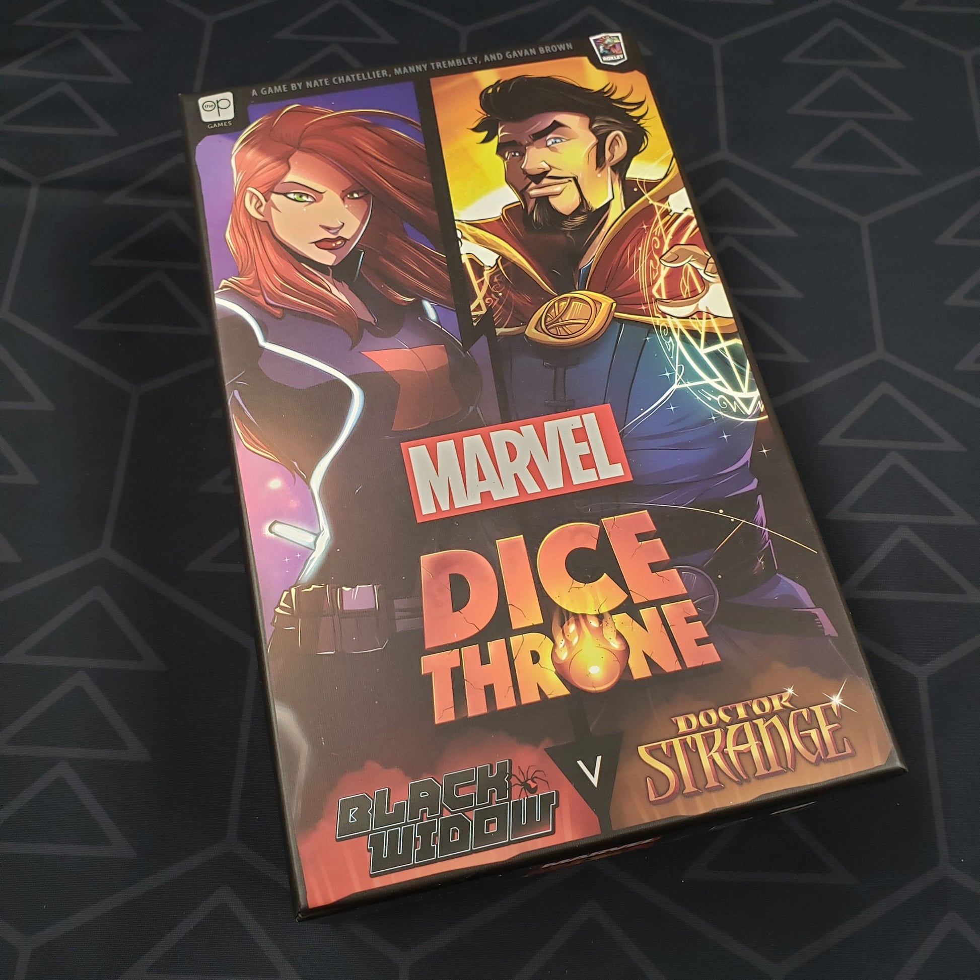 Image shows the front cover of the box of the Marvel Dice Throne: Black Widow v. Doctor Strange board game