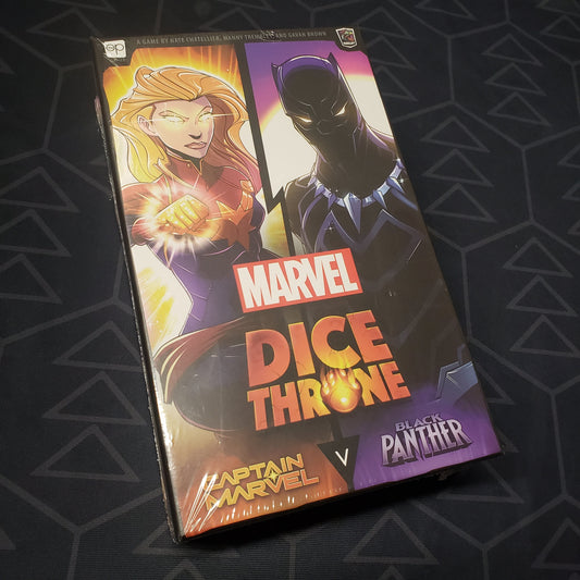 Image shows the front cover of the box for the Marvel Dice Throne: Captain Marvel v. Black Panther board game