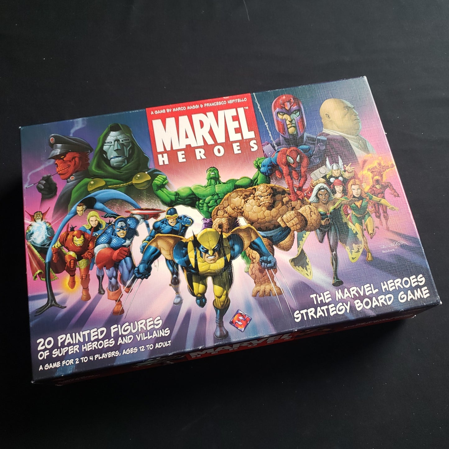 Image shows the front cover of the box of the Marvel Heroes board game