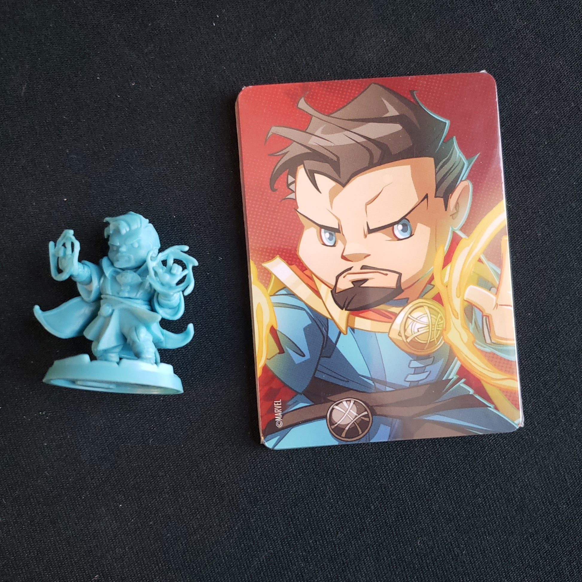 Image shows the miniature and cards for the Doctor Strange expansion for the board game Marvel United