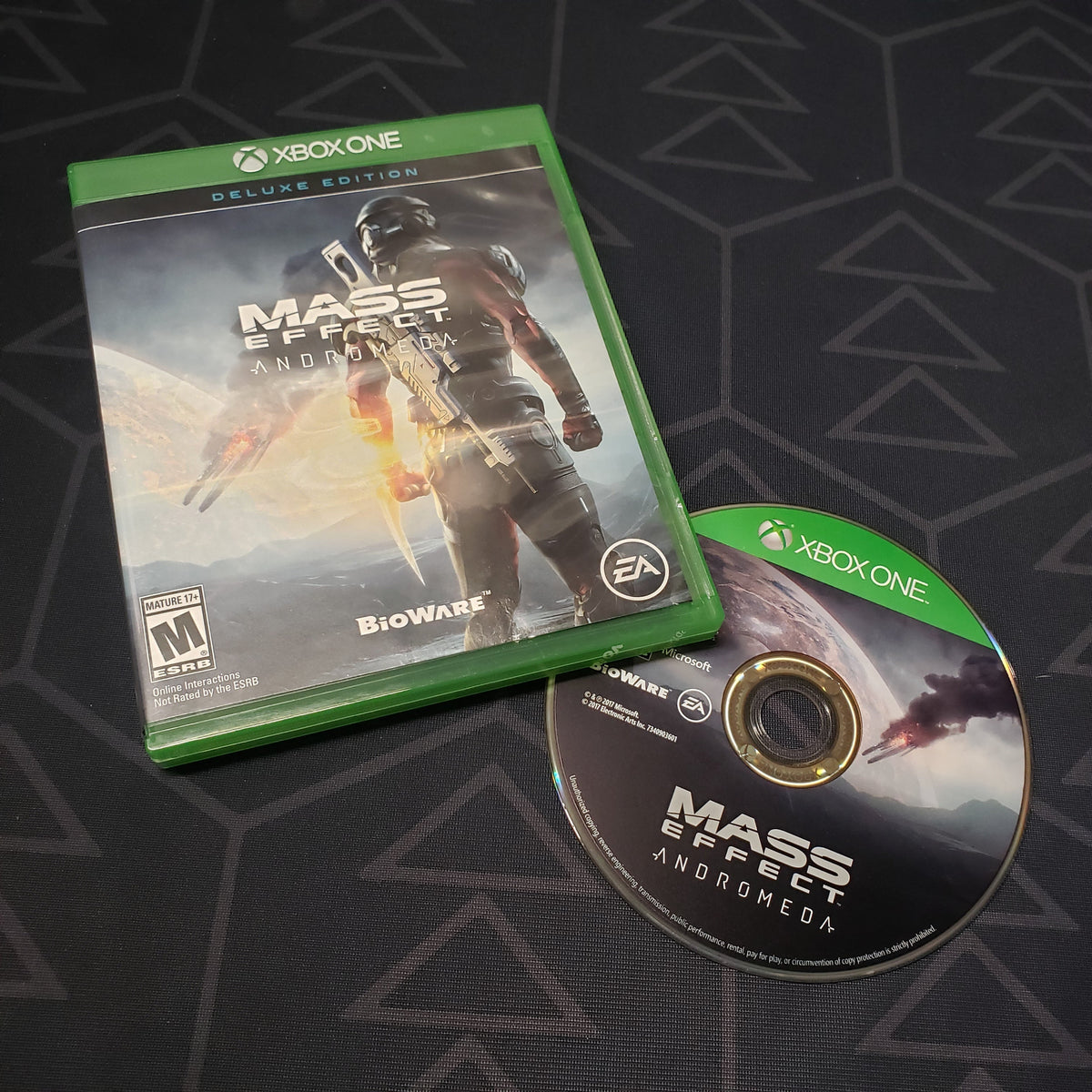 Image shows the deluxe edition case and disc for the video game Mass Effect: Andromeda for Xbox One