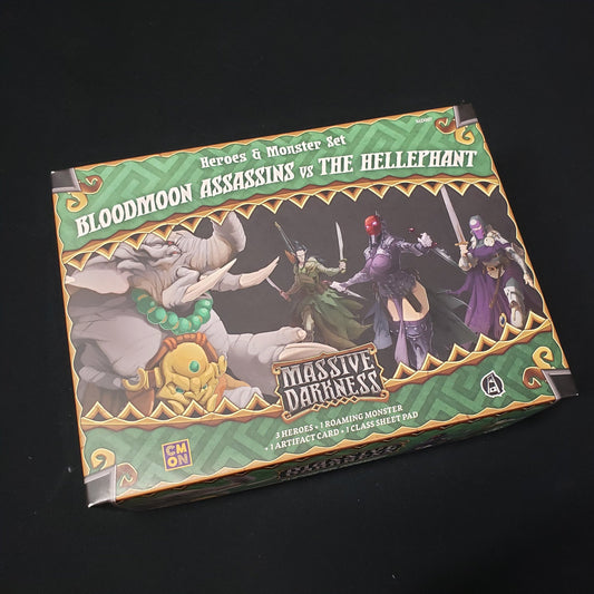 Image shows the front cover of the box of the Bloodmoon Assassins vs the Hellephant expansion for the board game Massive Darkness
