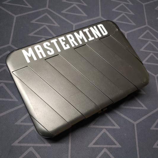 Image shows the front of the case for the Mastermind: Travel Edition board game