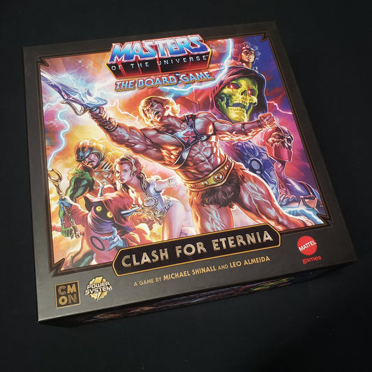 Image shows the front cover of the box of the Masters of the Universe: The Board Game - Clash for Eternia