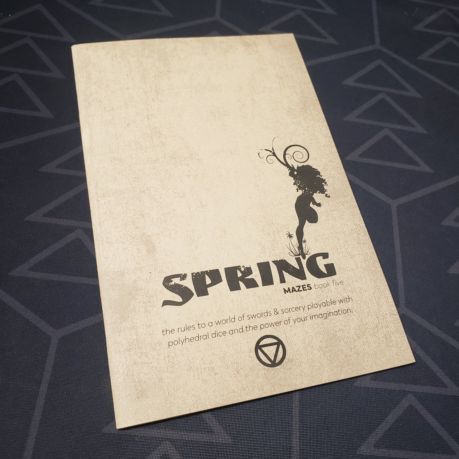 Image shows the front cover of the Book Five: Spring book for the roleplaying game Mazes