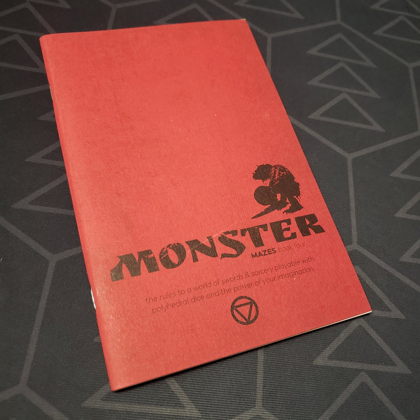 Image shows the front cover of the Book Four: Monster zine for the roleplaying game Mazes