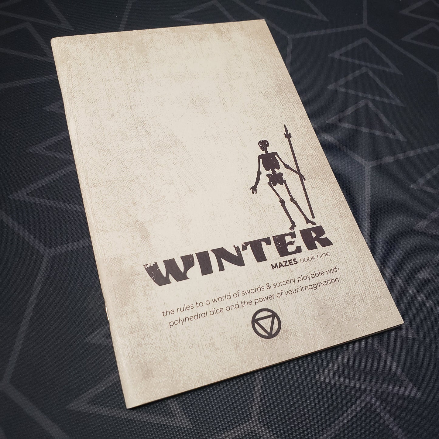 Image shows the front cover of the Book Nine: Winter zine for the roleplaying game Mazes