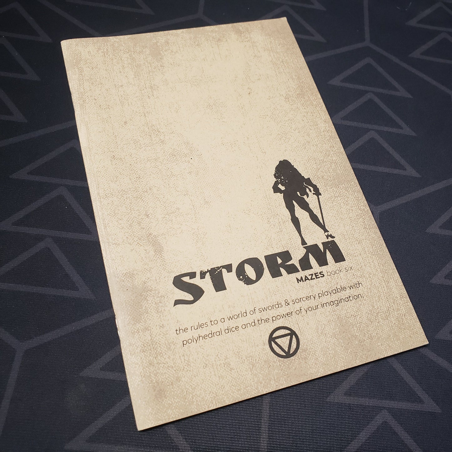 Image shows the front cover of the Book Six: Storm zine for the roleplaying game Mazes
