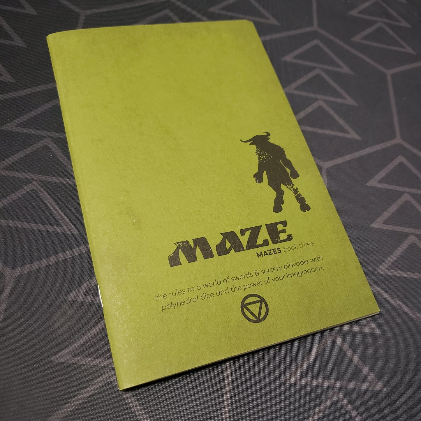 Image shows the front cover of the Book Three: Maze zine for the roleplaying game Mazes