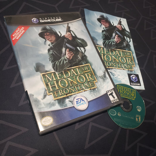 Image shows the case, manual and disc for the video game Medal of Honor: Frontline for Nintendo GameCube