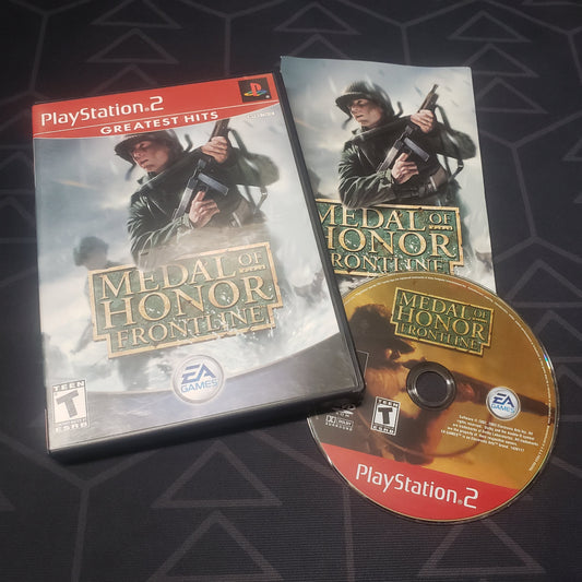 Image shows the case, manual and disc for the video game Medal of Honor: Frontline for Playstation 2