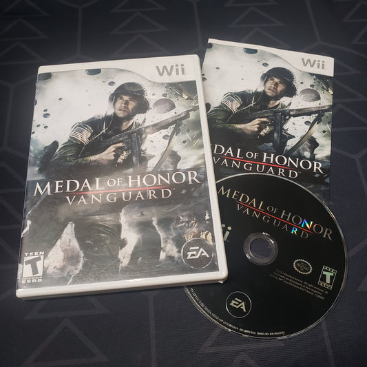 Image shows the case, manual and disc for the video game Medal of Honor: Vanguard for Nintendo Wii