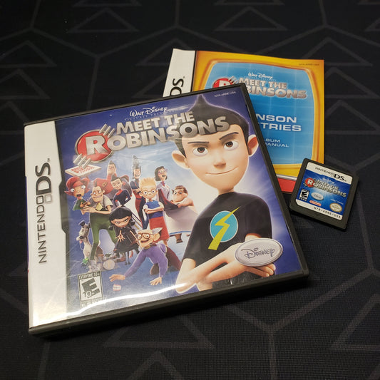 Image shows the case, manual and cartridge for the video game Meet the Robinsons for Nintendo DS