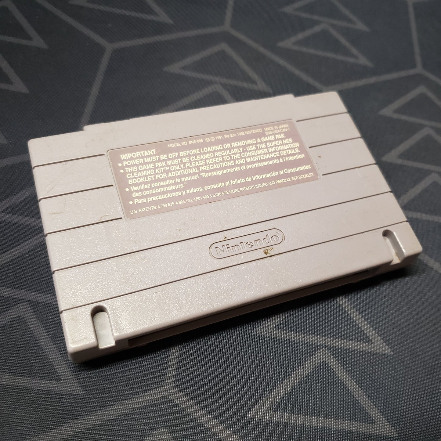 Image shows the back of the cartridge for the video game Mega Man X3 for Super Nintendo